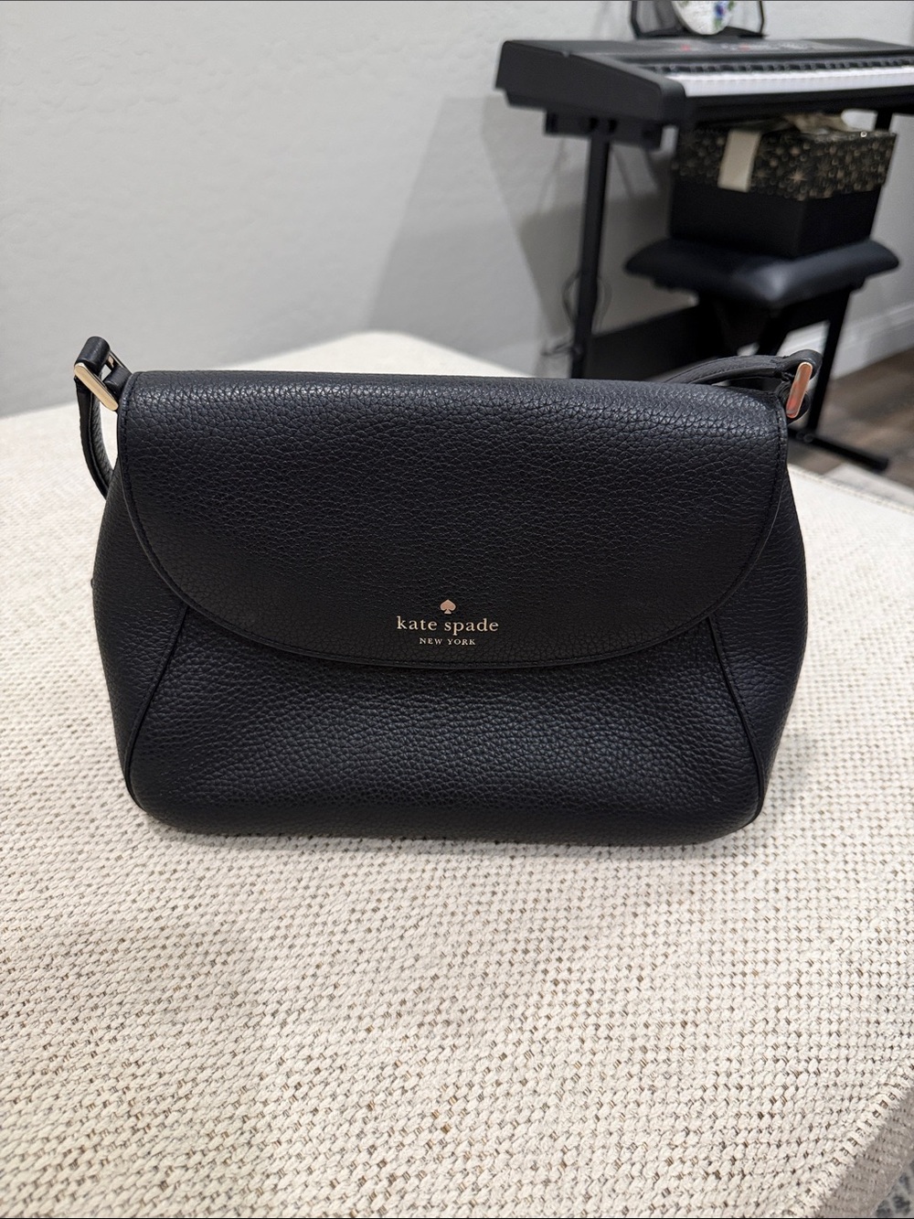 kate spade Black Pebbled Leather Flap Crossbody with Gold Logo